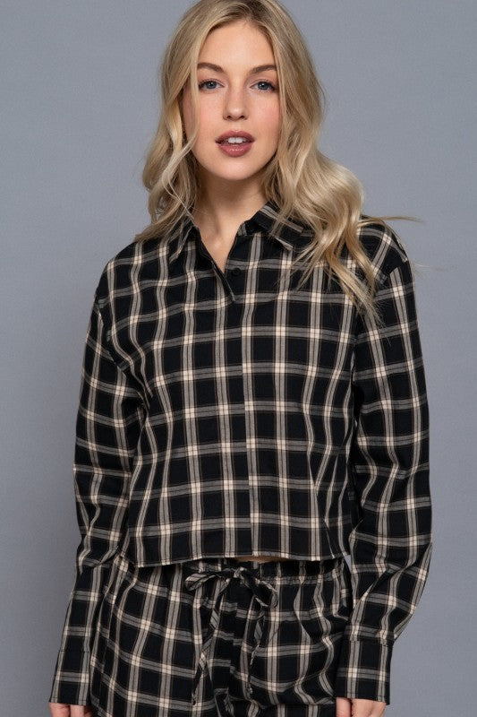 Black tartan plaid cropped button-down shirt with matching drawstring pants, front view.