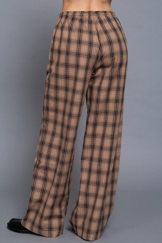 Beige tartan plaid wide-leg pants with an elastic waistband, back view.