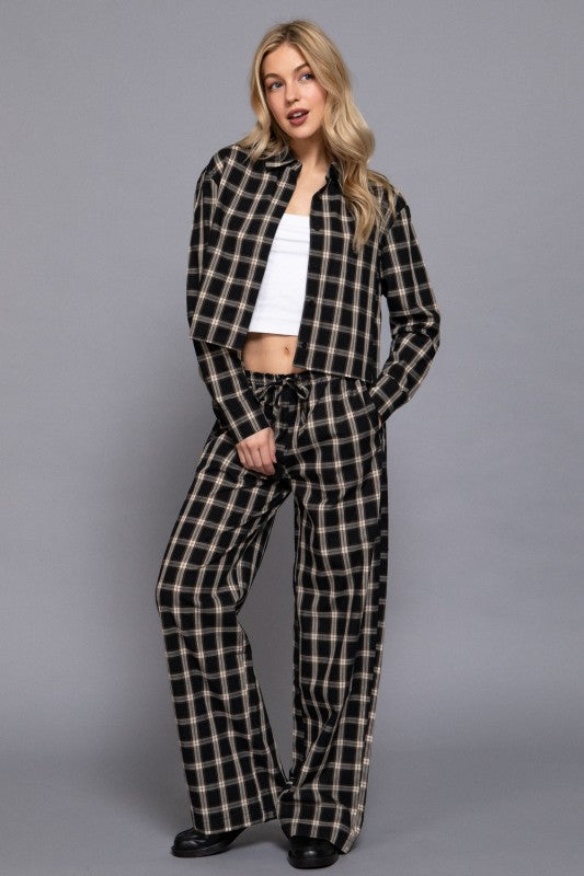 Black cotton tartan plaid matching set with an open cropped shirt and wide-leg pants, full-length view.