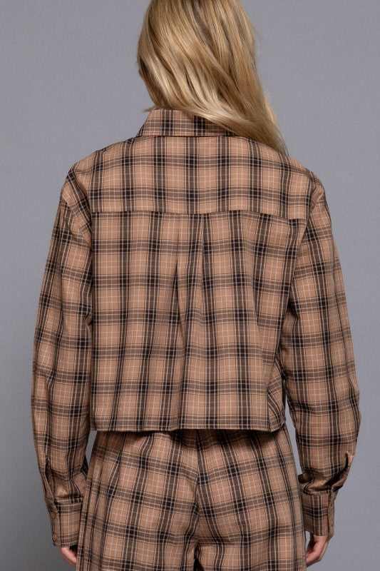 Beige tartan plaid cropped shirt showing the back yoke and pleat.