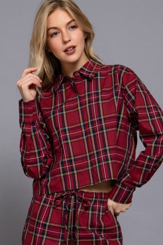 Red tartan plaid cropped button-down shirt with matching drawstring pants, front view.